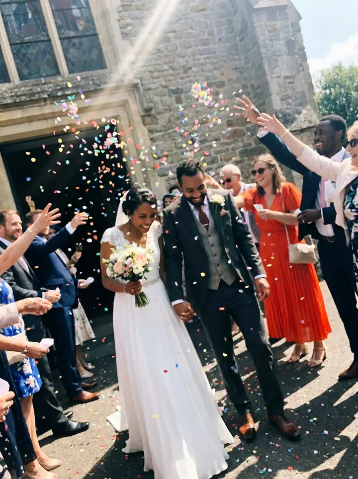 Confetti thrown as the couple walks out