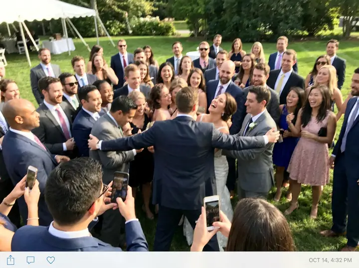 A chaotic group photo on the lawn